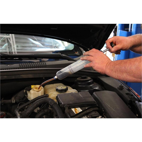 Extracteur de liquide Auto-Cam